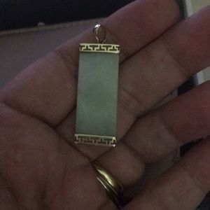 Jade and gold and pendant